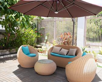 Oasis Boutique House - Garapan - פטיו