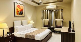 Grand Regent Hotel and Suites - Faisalābād - Bedroom