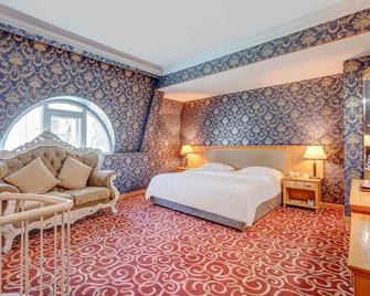 Modern Hotel - Harbin - Bedroom