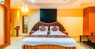 Fabhotel Palash Residency - Ranchi - Bedroom