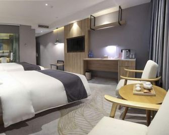 Yunyi Art Hotel - Rizhao - Schlafzimmer