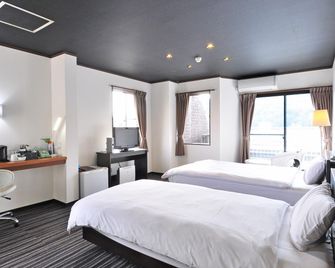 Tsuyama Grand Hotel - Tsuyama - Bedroom