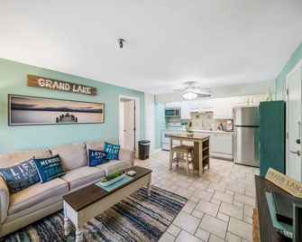 Escape to Paradise on Grand Lake- Monkey Island Condo w Pool! - Afton - Living room