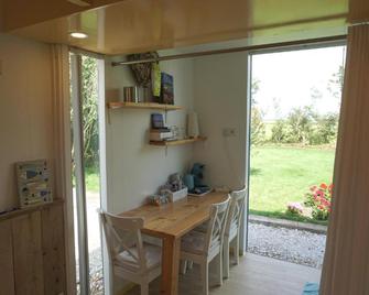 B&B Zuiderkreek - De Cocksdorp - Comedor