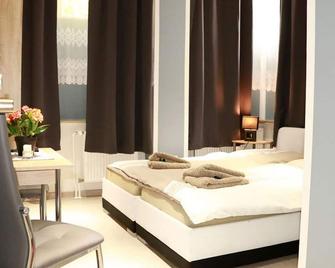 Amaya Motel - Berlin - Schlafzimmer