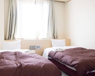 Kanonji Grand Hotel - Kotohira - Bedroom