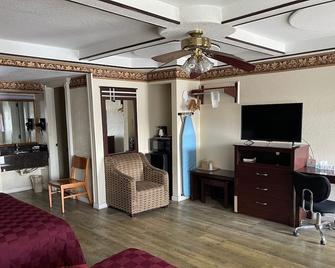 Budget Inn & Suites Shoreline - Corpus Christi - Schlafzimmer