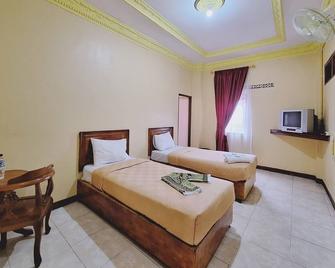 Yuriko Hotel - Bukittinggi - Bedroom