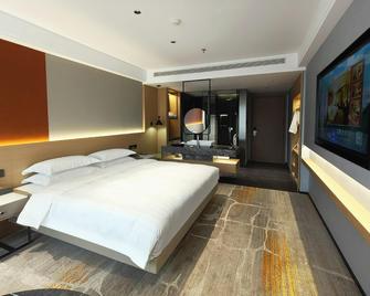 Central Plaza Hotel - Dalian - Makuuhuone