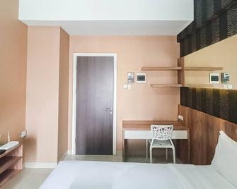 Classic Studio at Student Castle Yogyakarta Apartment By Travelio - Depok