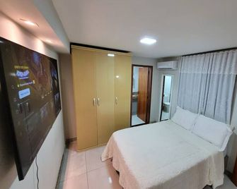 Pure comfort in Flat 1 - 5 min from the center - Governador Valadares - Bedroom