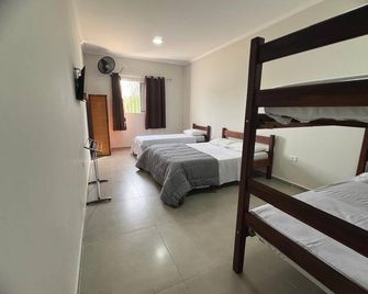 Leviv Praia Hotel - Caraguatatuba - Schlafzimmer