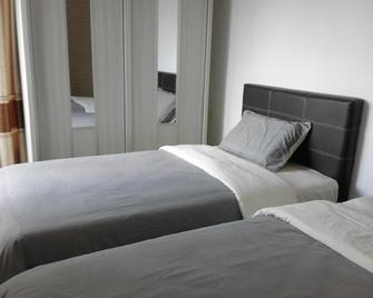 Homelite Resort Water Theme Park Condominium - Miri - Bedroom