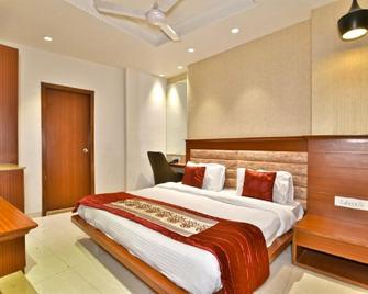 Hotel Highland Inn - Amritsar - Slaapkamer