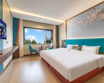 Ming Zuo Xing Tan Hotel - Jining - Slaapkamer