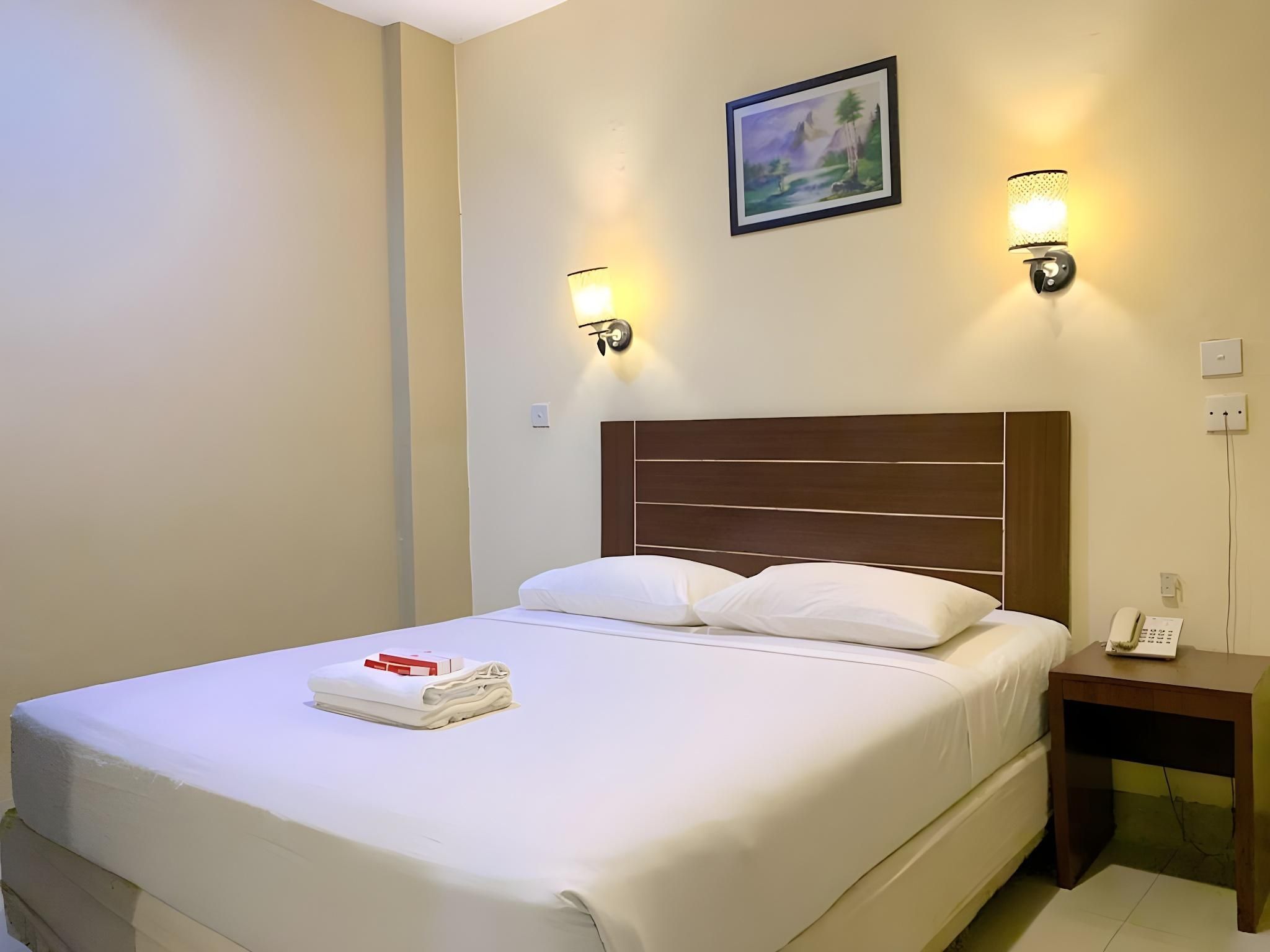 Hotel Parma Pekanbaru - Pekanbaru - Ložnice