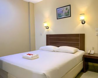 Hotel Parma Pekanbaru - Pekanbaru - Habitación