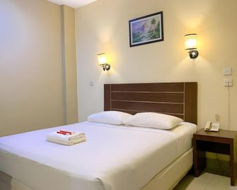 Hotel Parma Pekanbaru - Pekanbaru - Ložnice