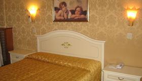 Airone Hotel - Venedig - Schlafzimmer