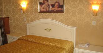 Airone Hotel - ונציה - חדר שינה