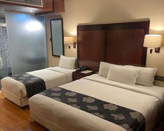 بارك أفينيو هوتل - تشناي - غرفة نوم