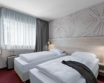 Serways Hotel Steigerwald Süd - Wachenroth - Bedroom