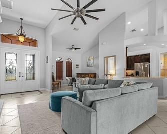 Outdoor Pool Table and Ping Pong Table, Heated Pool - Villa Terrapin - Roelens Vacations - Matlacha - Living room