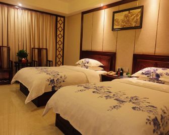 Yuxia International Hotel - Ji'an - Bedroom