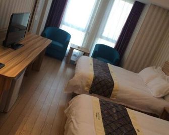 Tujia Sweetome Apartment Qingdao Golden Square - Qingdao - Bedroom