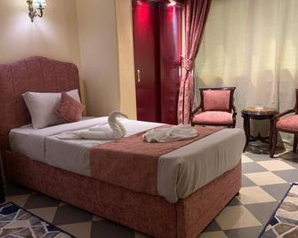 فندق هوليدايز إكسبريس - القاهرة - غرفة نوم