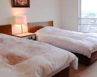 Amagi Kankou Hotel Amagikan - Asakura - Ložnice