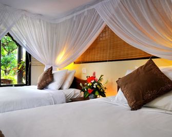 Hidden Paradise Cottages - Abang - חדר שינה