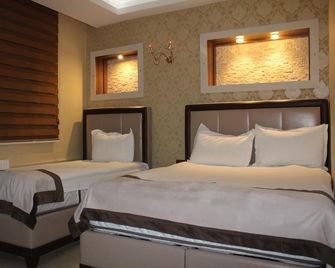 Kars Konak Hotel - Kars - Ložnice