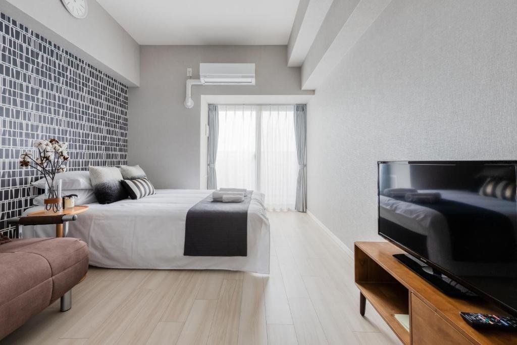 أوستاي شين أوساكا هوتل أبارتمنت - أوساكا - غرفة نوم