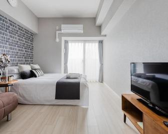 Ostay Shin-Osaka Hotel Apartment - Osaka - Bedroom