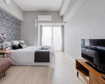 أوستاي شين أوساكا هوتل أبارتمنت - أوساكا - غرفة نوم