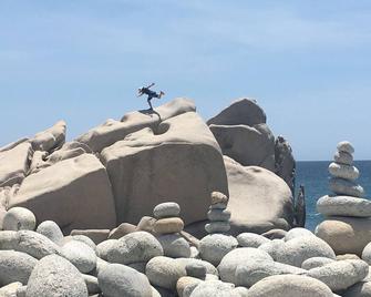 Traditional stone palapa retreat with ocean and desert views - Cabo Pulmo - Building