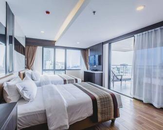 Golden Jomtien Beach Hotel - Jomtien - Спальня