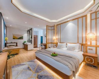 Yunyin Sanqiu Inn - Diqing - Bedroom