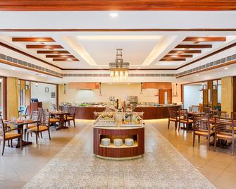 Club Mahindra Golden Landmark, Mysuru - Mysore - Restaurante