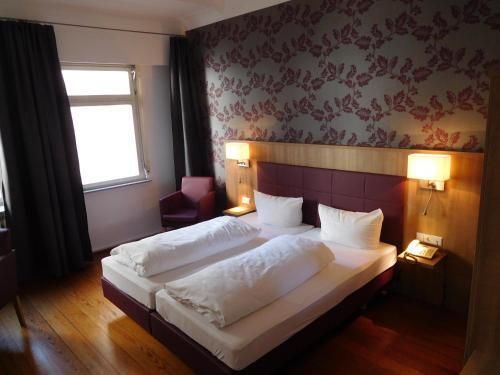 Am Kornmarkt - היידלברג - חדר שינה