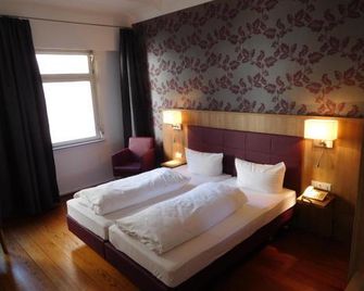 Hotel Am Kornmarkt - Heidelberg - Schlafzimmer