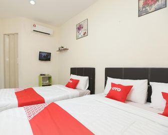 OYO 89902 Semerah Suites Homestay - Pontian Kechil - Habitación