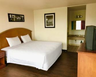 Bossier Inn & Suites Bossier City - Bossier City - Bedroom