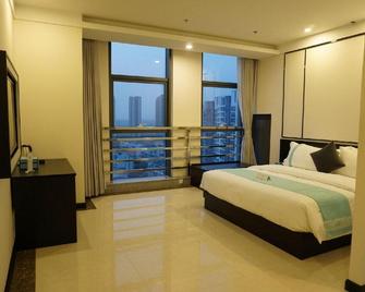 Xana Hotels Tianjin Huaxi Dian - Tianjín - Habitación