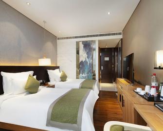 Jinyu Holiday Hotel - Shiyan - Camera da letto