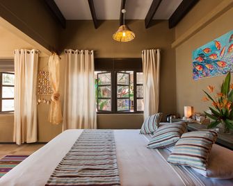 فيلاز ديه آليزيز - Grand'Anse Praslin - غرفة نوم