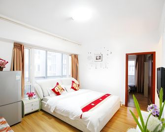 Chengdu Xinyueyaju Apartment - Chengdu - Bedroom