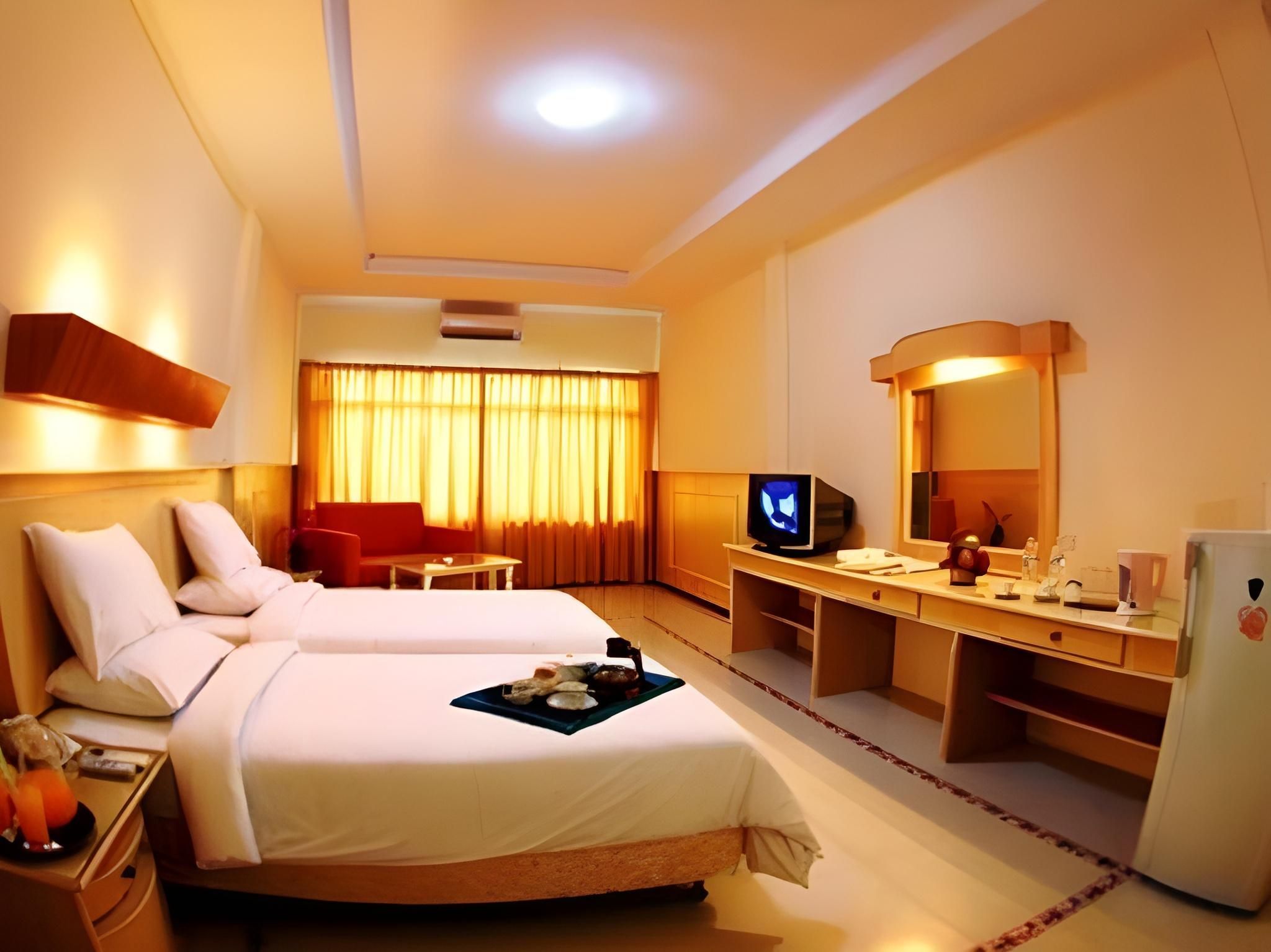 Hotel Duta - بالمبانغ - غرفة نوم