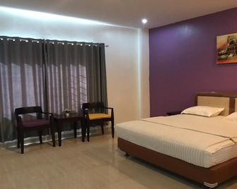 Liras Hotel Syariah - Kendari - Slaapkamer